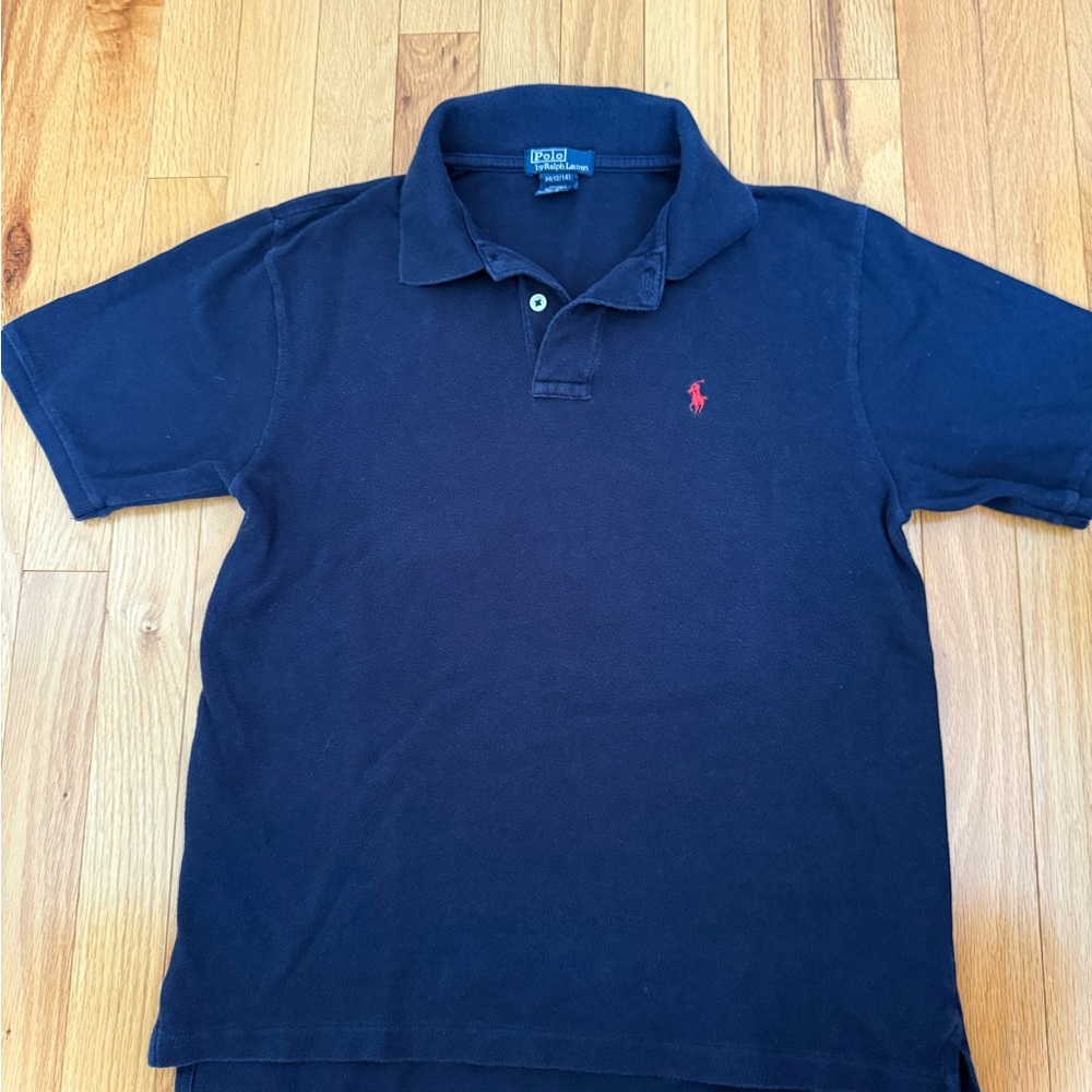 Ralph Lauren Dark Blue Polo with Red Logo
Kids size medium (12-14)